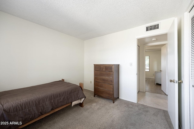 1454 W Capri Ave, Mesa, AZ 85202 - bedroom featuring carpet and a textured ceiling