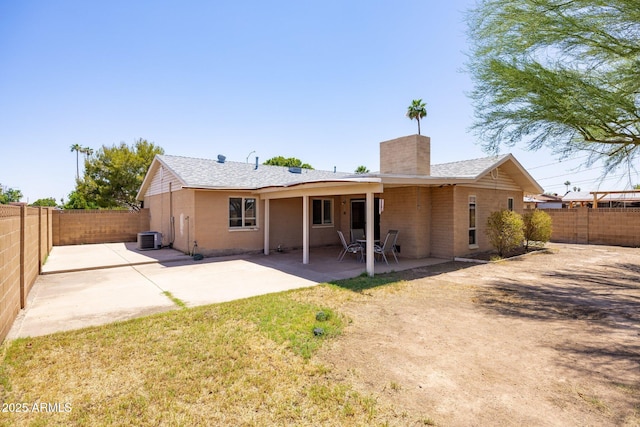 1454 W Capri Ave, Mesa, AZ 85202 - rear view of house featuring a chimney, a fenced backyard, and a patio