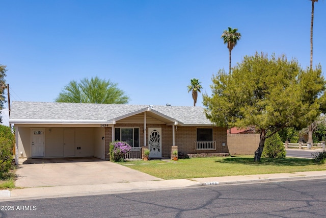 1454 W Capri Ave, Mesa, AZ 85202 - single story home featuring concrete driveway, a carport, brick siding, and roof with shingles