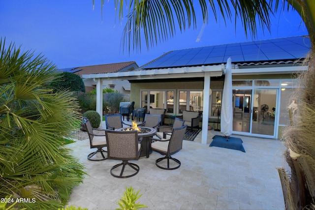 view of patio / terrace featuring a fire pit