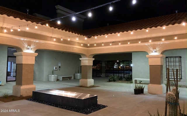 view of patio at twilight