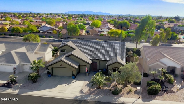 birds eye view of property featuring a residential view and a mountain view