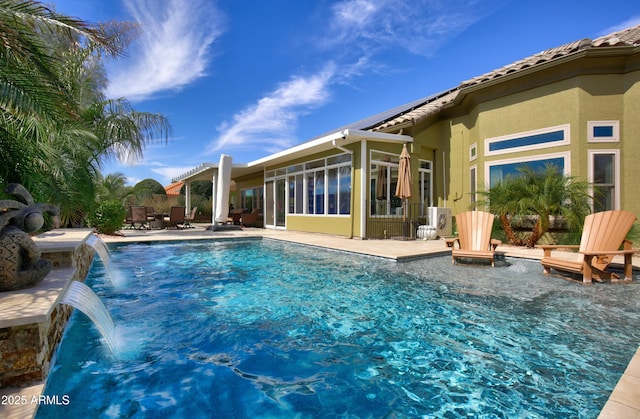 pool with a patio