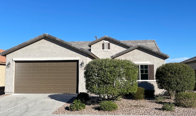 view of front of property with a garage