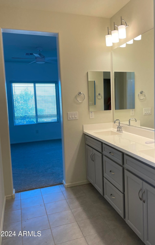 bathroom with vanity and tile patterned flooring