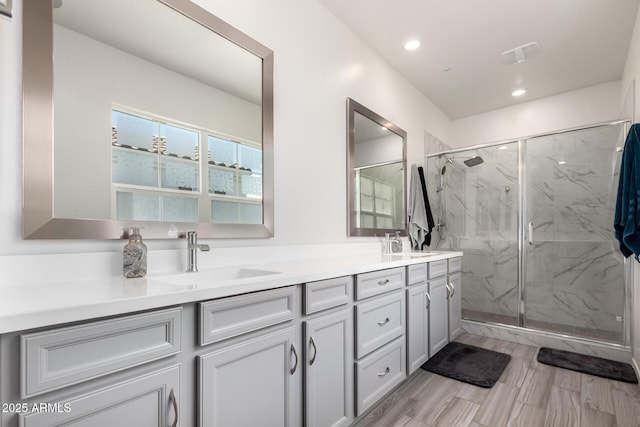 286 E Raleigh Dr, Chandler, AZ 85286 - full bath with double vanity, a marble finish shower, and recessed lighting