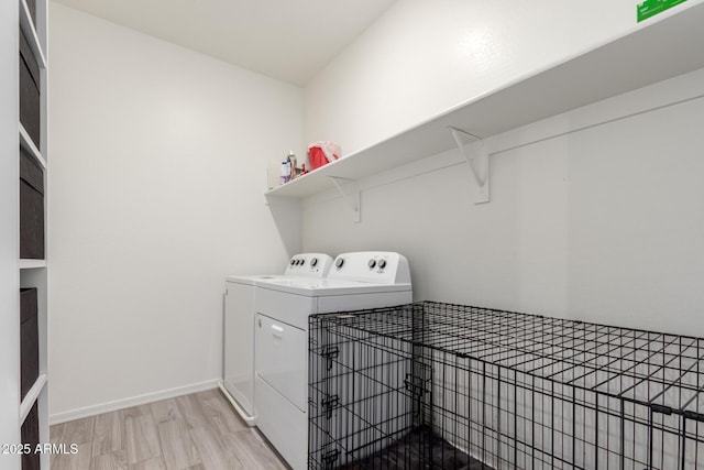 286 E Raleigh Dr, Chandler, AZ 85286 - laundry area with washing machine and clothes dryer, light wood-style flooring, and baseboards