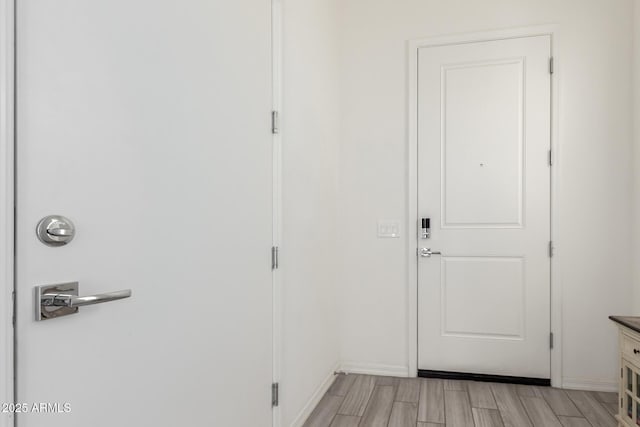 286 E Raleigh Dr, Chandler, AZ 85286 - entryway with light wood-style floors and baseboards