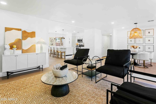 living room featuring light wood-type flooring