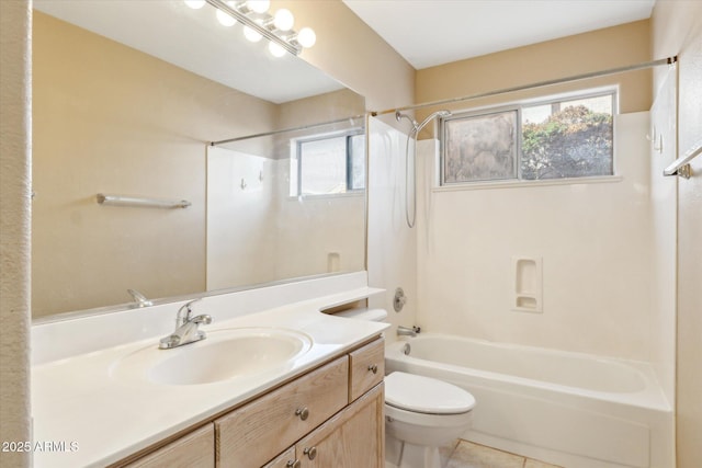 bathroom with tile patterned flooring, toilet, vanity, and shower / washtub combination