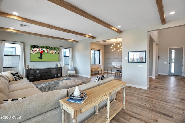 826 E Buist Ave, Phoenix, AZ 85042 - living room with a chandelier, baseboards, wood finished floors, recessed lighting, and beam ceiling