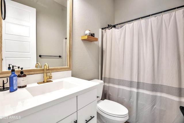 826 E Buist Ave, Phoenix, AZ 85042 - full bathroom with toilet, vanity, and a shower with shower curtain