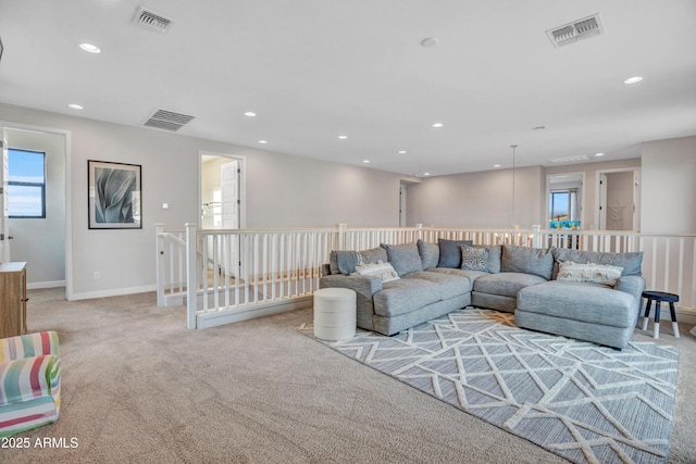 826 E Buist Ave, Phoenix, AZ 85042 - living room featuring carpet, recessed lighting, and baseboards