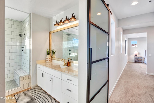 826 E Buist Ave, Phoenix, AZ 85042 - bathroom featuring a stall shower, baseboards, vanity, and recessed lighting