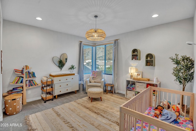 826 E Buist Ave, Phoenix, AZ 85042 - carpeted bedroom with a crib, baseboards, and recessed lighting