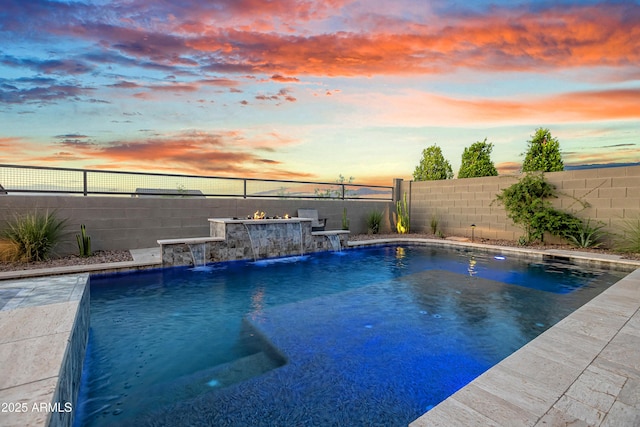 826 E Buist Ave, Phoenix, AZ 85042 - pool at dusk featuring a fenced backyard