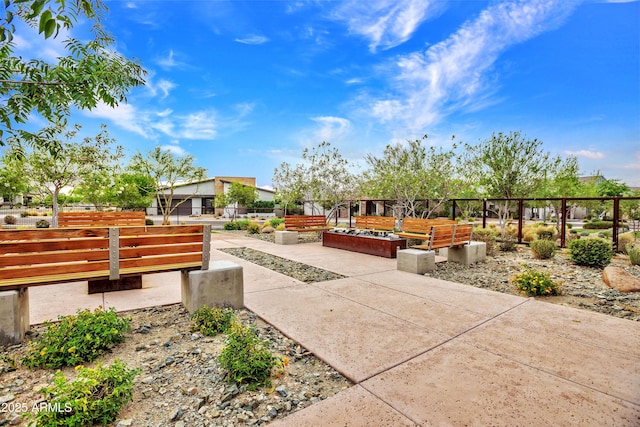 826 E Buist Ave, Phoenix, AZ 85042 - view of patio with a vegetable garden and fence