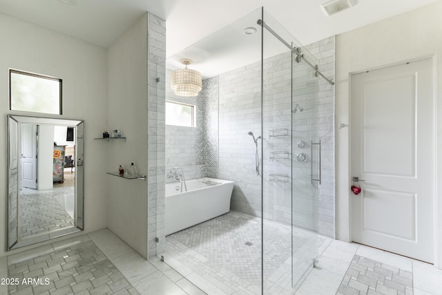 3511 N 39th Pl, Phoenix, AZ 85018 - full bathroom featuring a freestanding bath, a stall shower, and tile patterned flooring