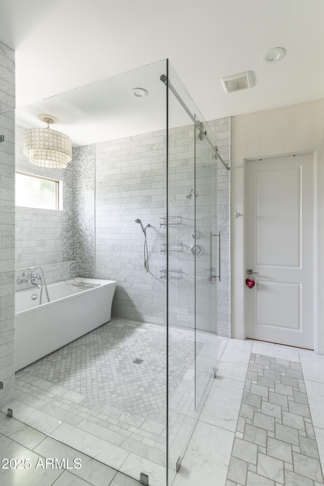3511 N 39th Pl, Phoenix, AZ 85018 - bathroom featuring a freestanding bath, a shower stall, tile patterned floors, and recessed lighting