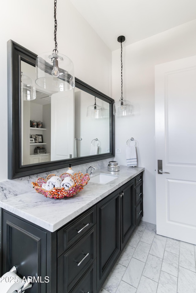 3511 N 39th Pl, Phoenix, AZ 85018 - bathroom with marble look tile flooring and vanity