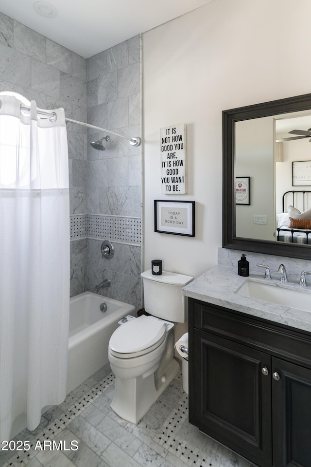 3511 N 39th Pl, Phoenix, AZ 85018 - bathroom featuring shower / bath combo with shower curtain, toilet, and vanity