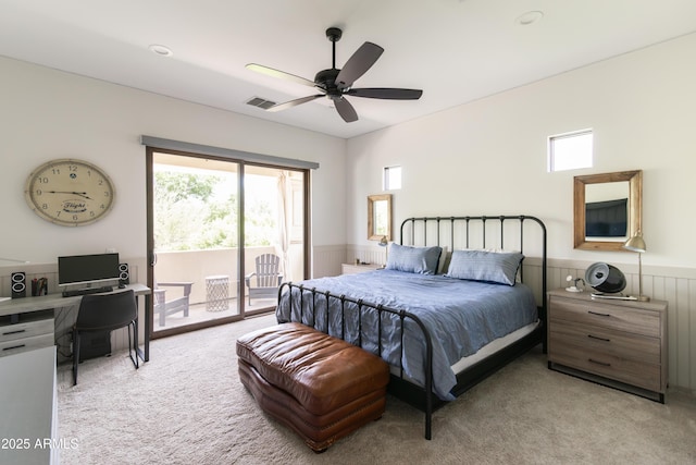 3511 N 39th Pl, Phoenix, AZ 85018 - bedroom featuring access to outside, light colored carpet, a wainscoted wall, an office area, and ceiling fan