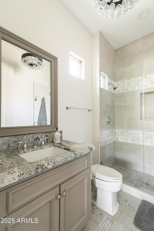 3511 N 39th Pl, Phoenix, AZ 85018 - full bath featuring toilet, vanity, a shower stall, and tile patterned flooring