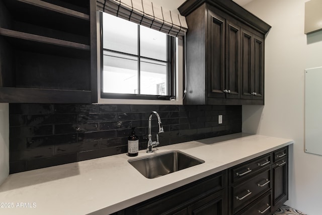 3511 N 39th Pl, Phoenix, AZ 85018 - kitchen featuring a sink, tasteful backsplash, and light countertops
