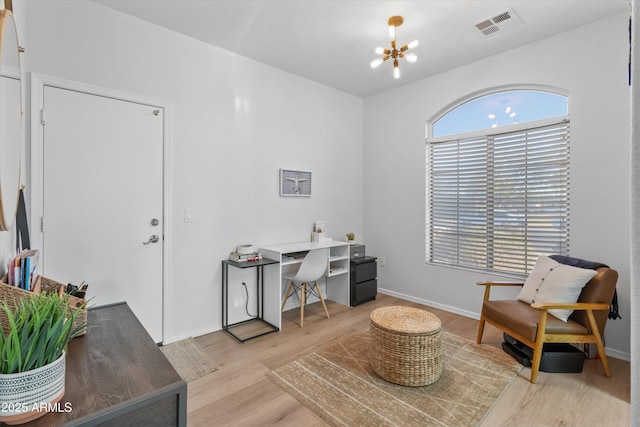 470 N 168th Ln, Goodyear, AZ 85338 - office featuring a notable chandelier, baseboards, visible vents, and light wood-type flooring