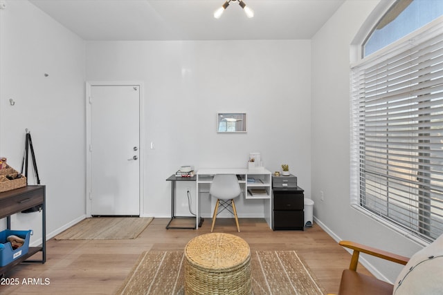 470 N 168th Ln, Goodyear, AZ 85338 - office area featuring baseboards and light wood-style flooring