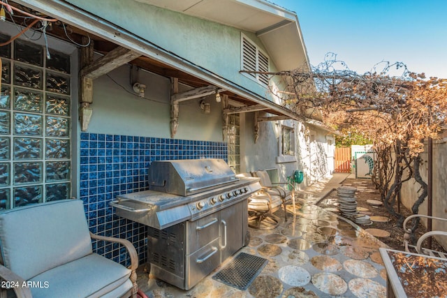 view of patio / terrace featuring fence and area for grilling