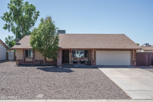 single story home with a garage