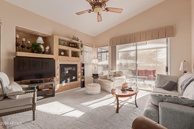 living room with ceiling fan, light carpet, and vaulted ceiling