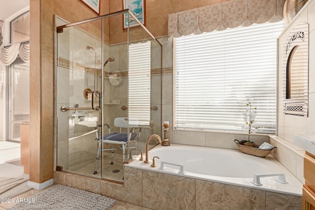 bathroom with plus walk in shower and tile patterned flooring