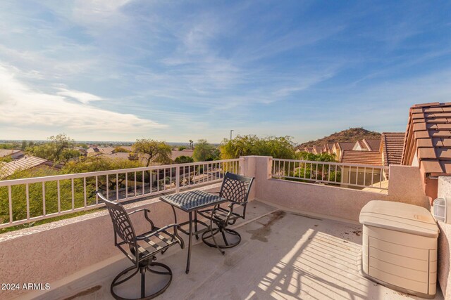 view of patio with a balcony