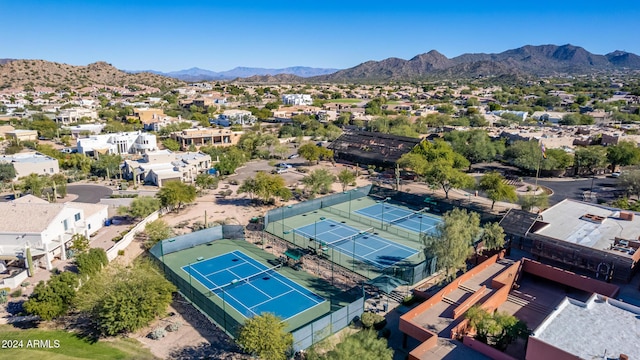 birds eye view of property featuring a mountain view