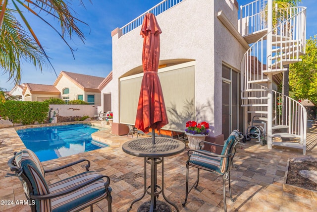 view of pool with a patio area