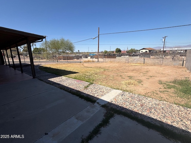 view of yard featuring a patio area and fence