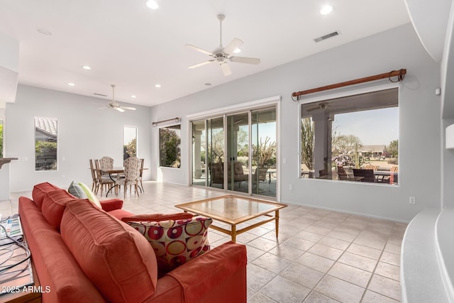 living room featuring a ceiling fan, recessed lighting, visible vents, and light tile patterned flooring