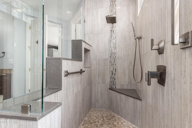 bathroom with a walk in shower