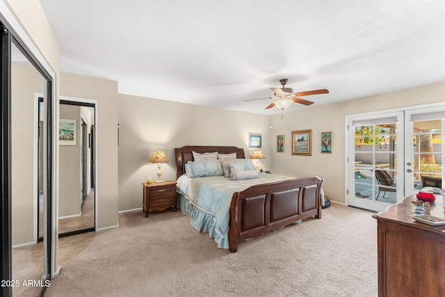 bedroom featuring baseboards, access to outside, french doors, and light colored carpet