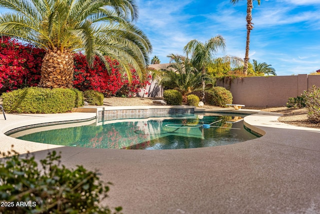 view of pool with fence and a fenced in pool