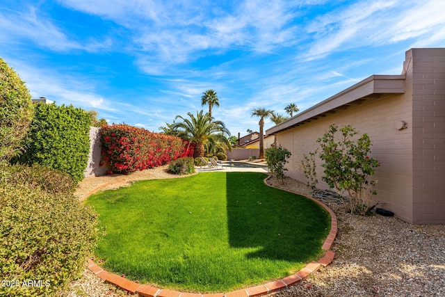 view of yard with a patio and fence