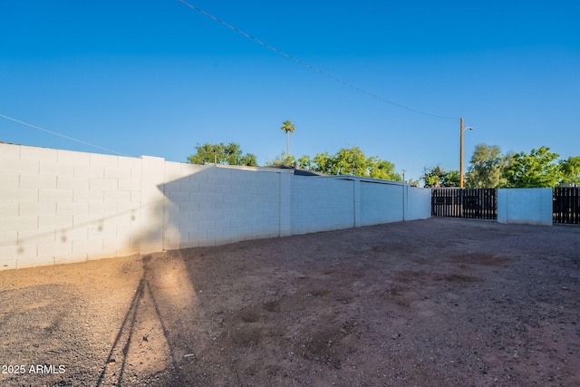 3834 E Clarendon Ave, Phoenix, AZ 85018 - fenced backyard with a gate