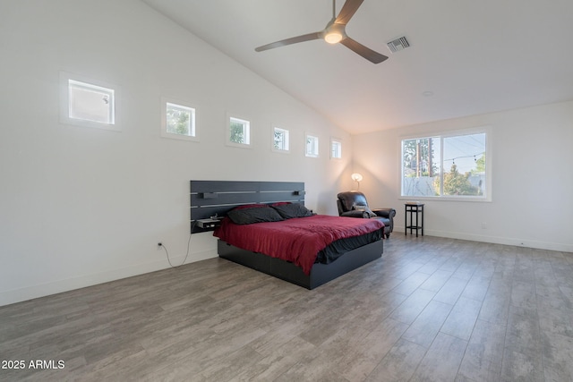 3834 E Clarendon Ave, Phoenix, AZ 85018 - bedroom featuring wood finished floors, baseboards, high vaulted ceiling, and ceiling fan