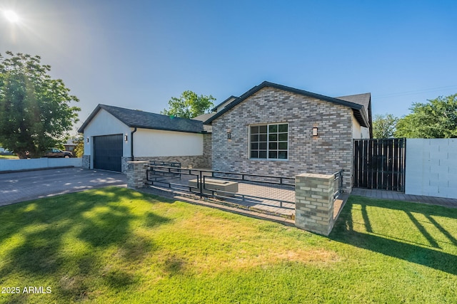 3834 E Clarendon Ave, Phoenix, AZ 85018 - view of front of house featuring an attached garage and a gate
