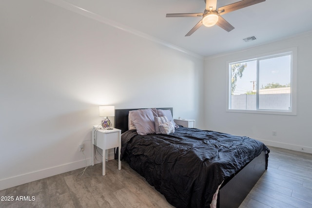 3834 E Clarendon Ave, Phoenix, AZ 85018 - bedroom featuring ornamental molding, light wood finished floors, baseboards, and a ceiling fan