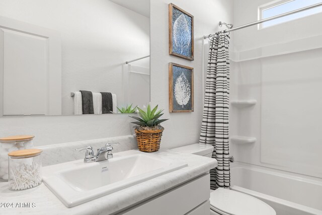 18348 W Gray Fox Trl, Wittmann, AZ 85361 - full bathroom featuring toilet, vanity, and shower / tub combo with curtain