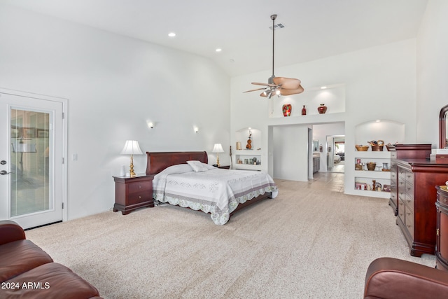 carpeted bedroom featuring ceiling fan, access to outside, and high vaulted ceiling