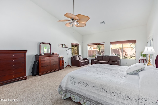 bedroom with light carpet, high vaulted ceiling, and ceiling fan